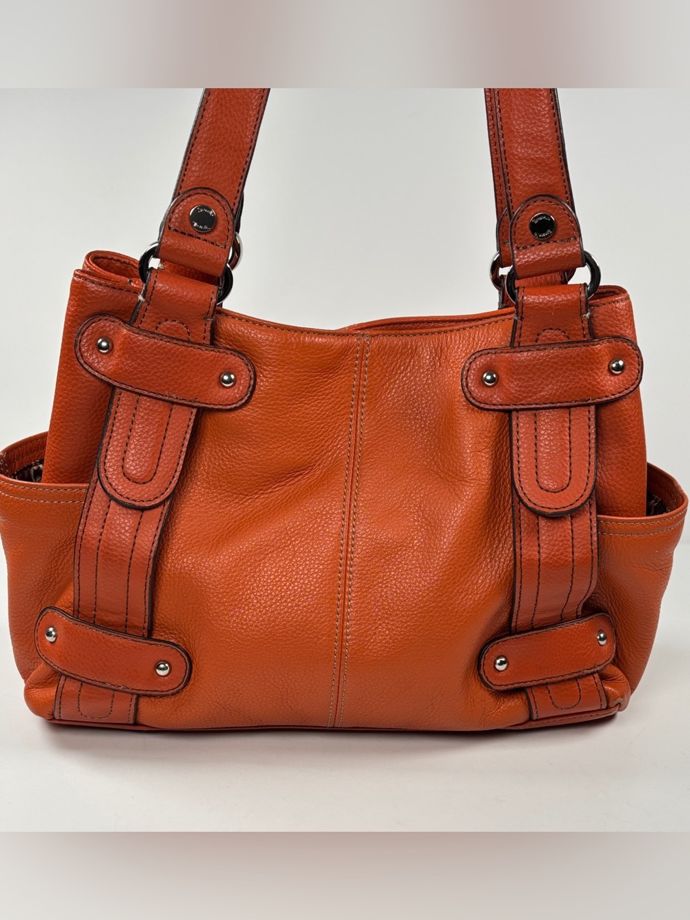 Tignanello Women's Orange Leather Shoulder Bag. Silver hardware. Brown interior